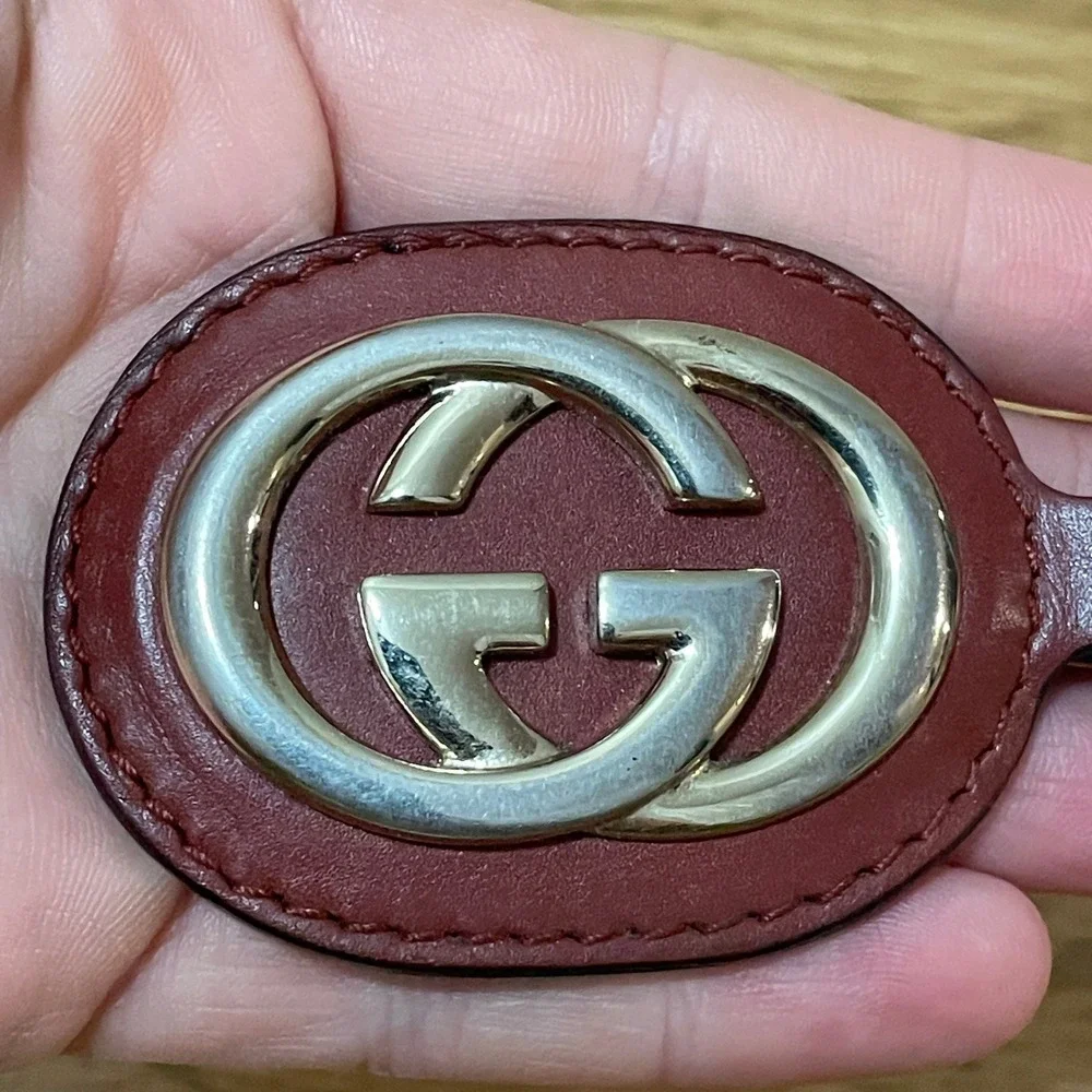 Gucci Sukey Interlocking GG Burgundy Leather Oval Keychain Gold Tone Bag Charm